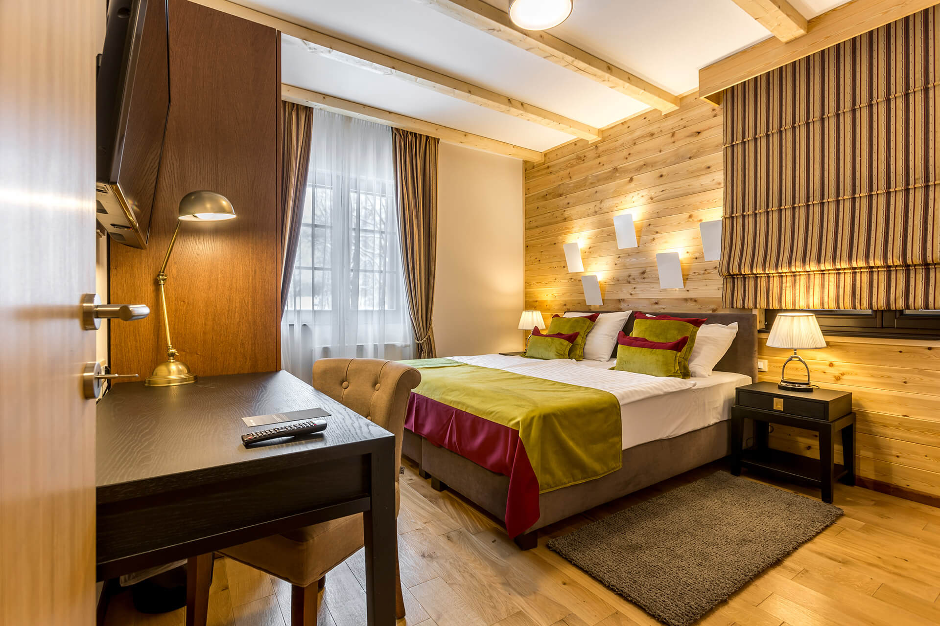 A room at the Fenomen Plitvice resort, natural materials and a calm setting